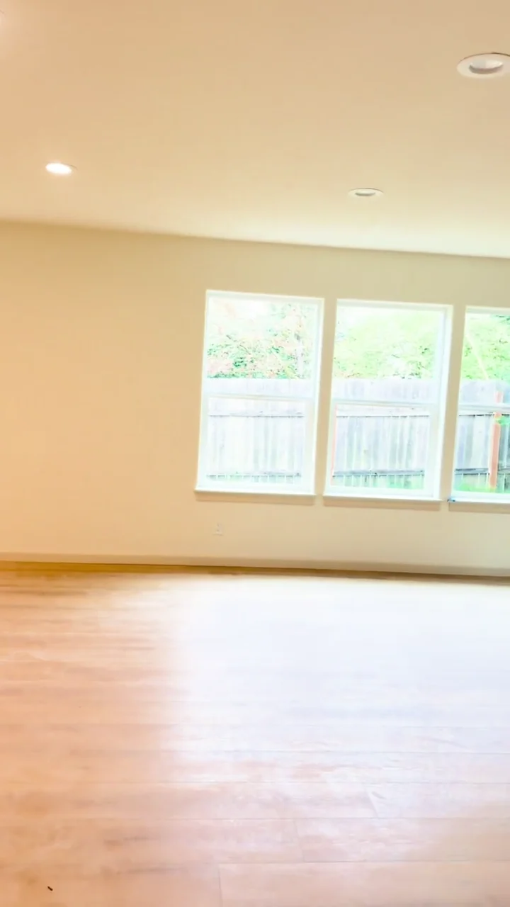 A finished home with smooth walls around the staircase, hallways and bedrooms.