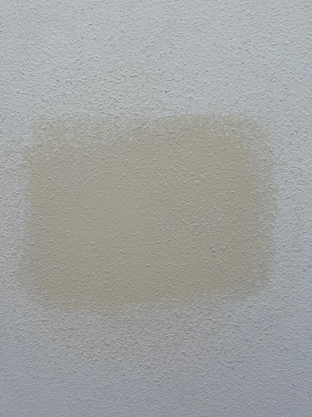 An Altus drywall patch blending into the surrounding wall.